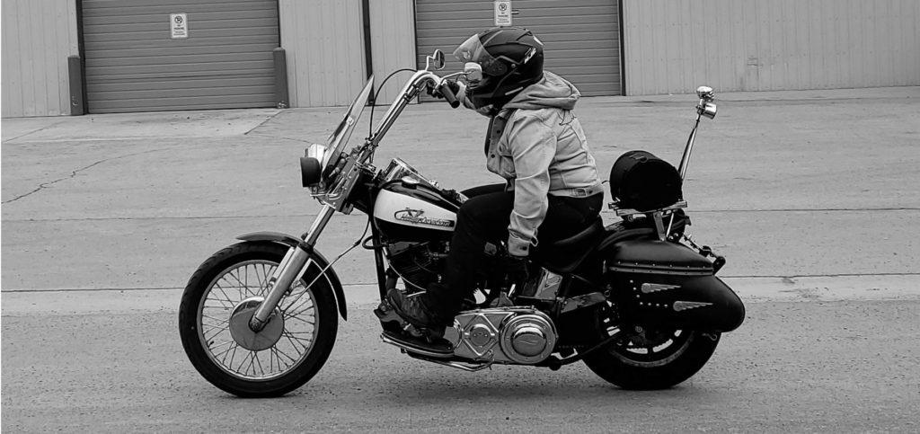 Photo of Abby riding '55 Panhead